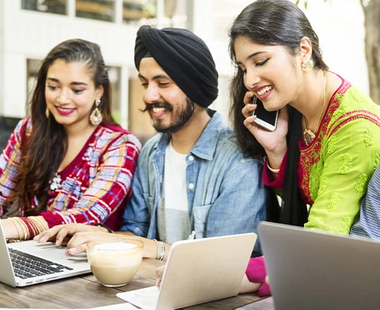 Group of engineering students working on AI and ML projects on campus