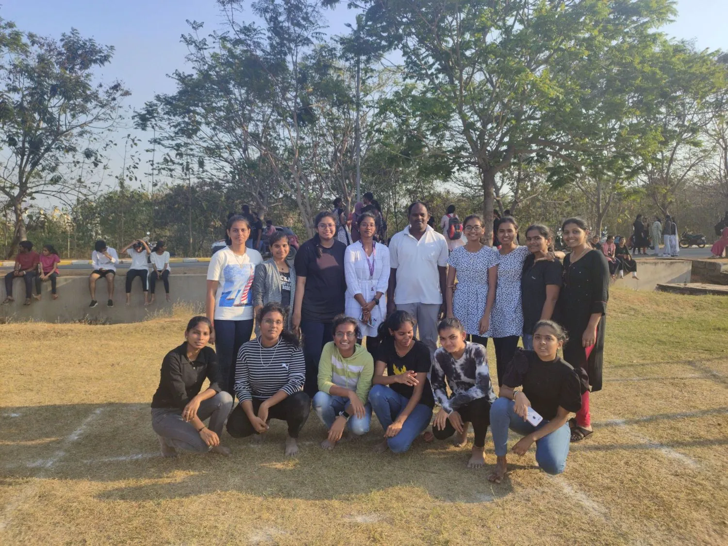 Apollo University kabaddi team posing together outdoors during inter-university tournament.