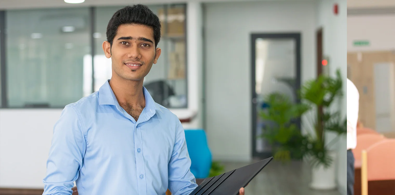Happy engineering student on campus, highlighting B.Tech CSE program at Apollo University