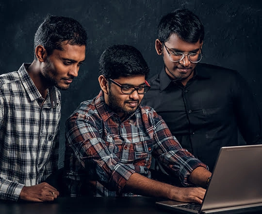 Group of students collaborating on embedded systems projects in lab of The Apollo university