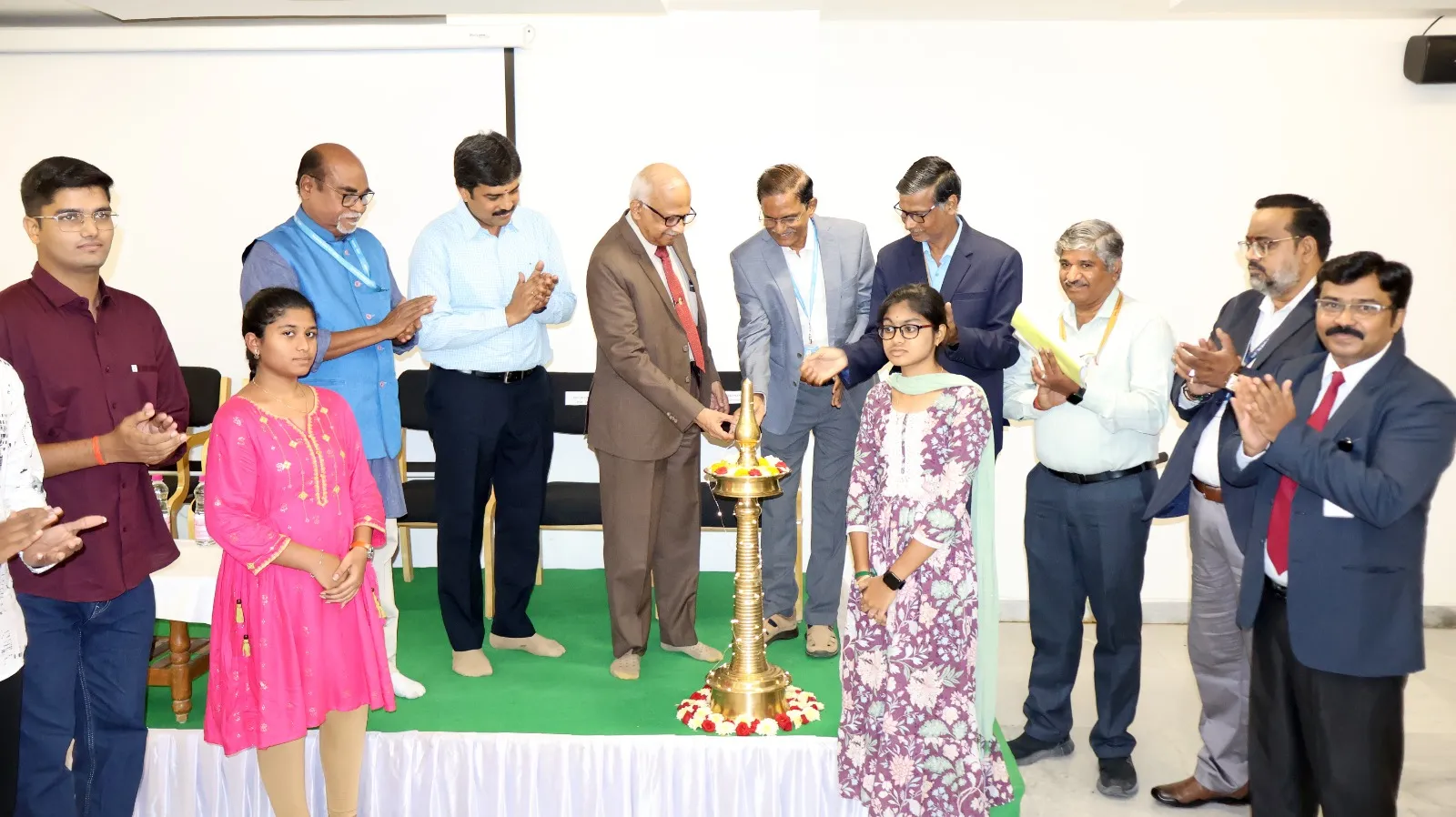 Dignitaries lighting the ceremonial lamp to inaugurate The Apollo University Induction Programme 2025-26