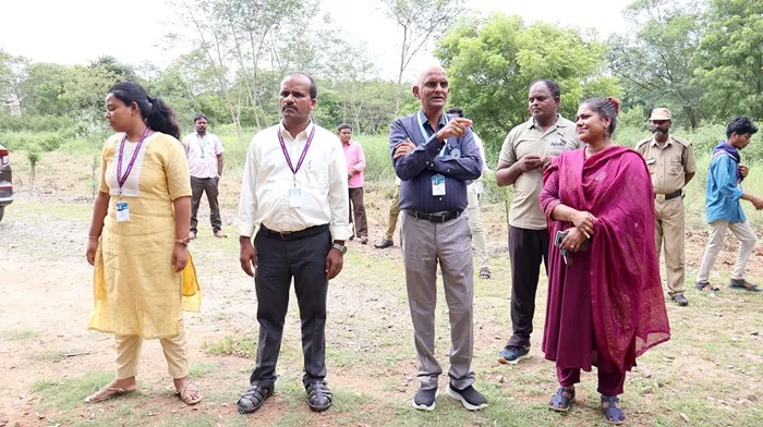 Eco-friendly activity: students and faculty participating in a plantation drive