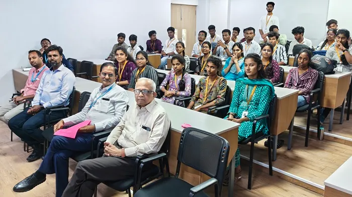 Students and faculty seated together during seminar