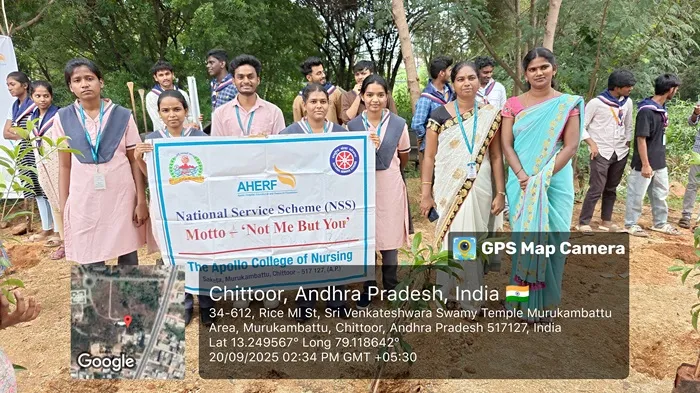 Student holding a NSS slogan banner at Swachha Andhra Plantation Drive 2025