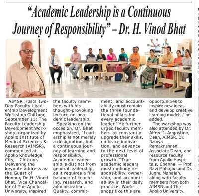 Newspaper photo of Dr. H. Vinod Bhat interacting with academic professionals.