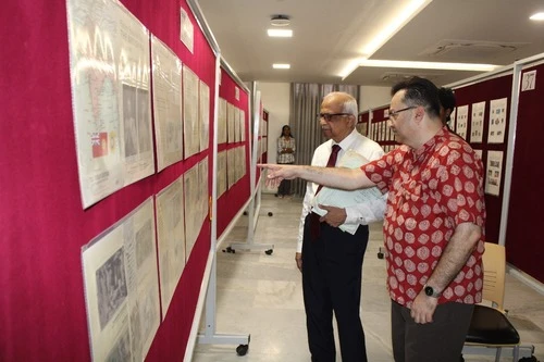 Dr. Kiran Acharya and Dr. H. Vinod Bhat visiting creative displays during ApolloPEX-2025
