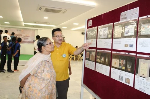 Dr. Parvathy Bhat and Dr. Kiran Acharya visiting the exhibition at ApolloPEX-2025.