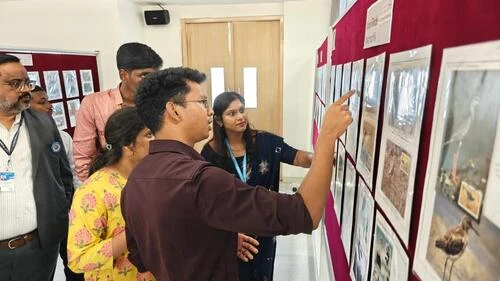 Attendees participating in discussions at ApolloPEX-2025 exhibition.