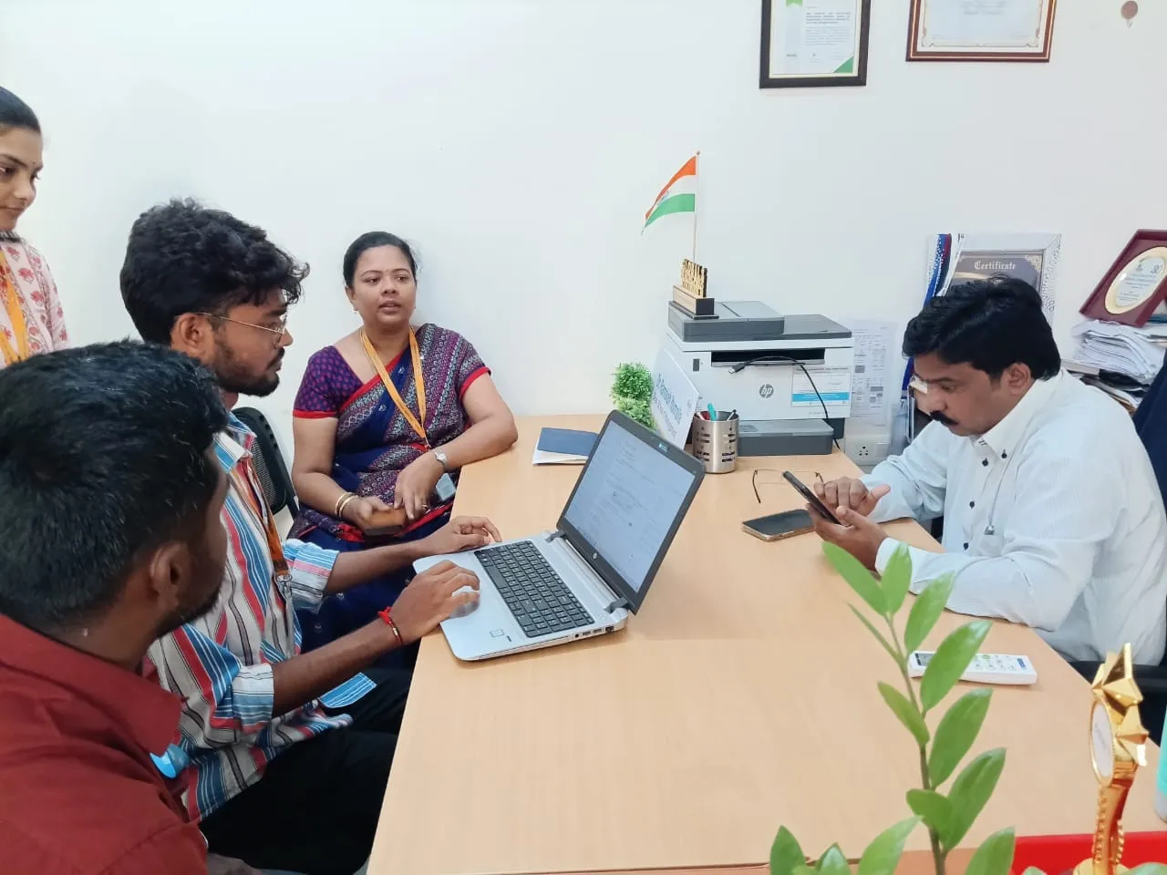 Group discussion between faculty and EWYL student intern at The Apollo University campus