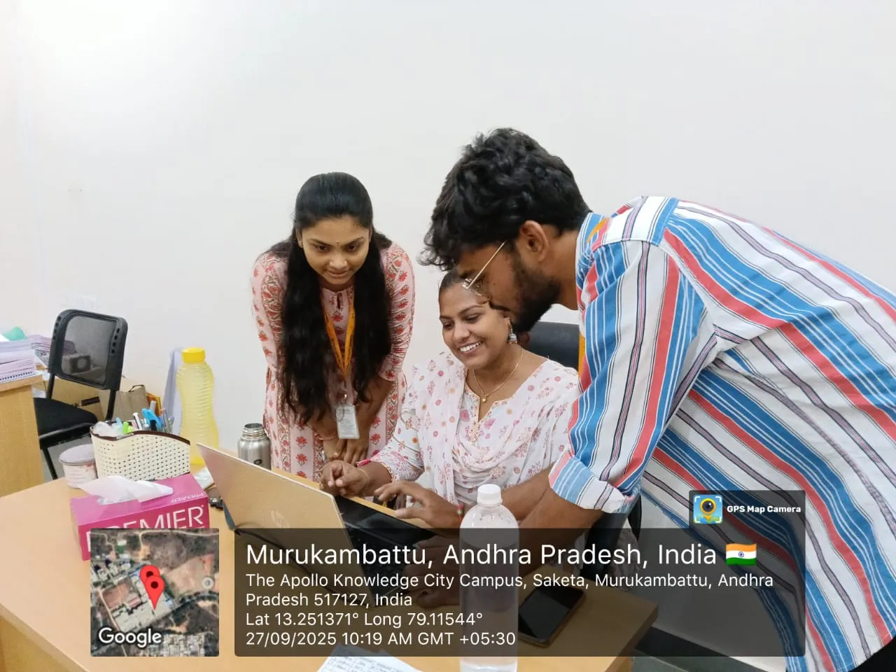 Dr. Shani interacting with EWYL student interns during a discussion session at The Apollo University.