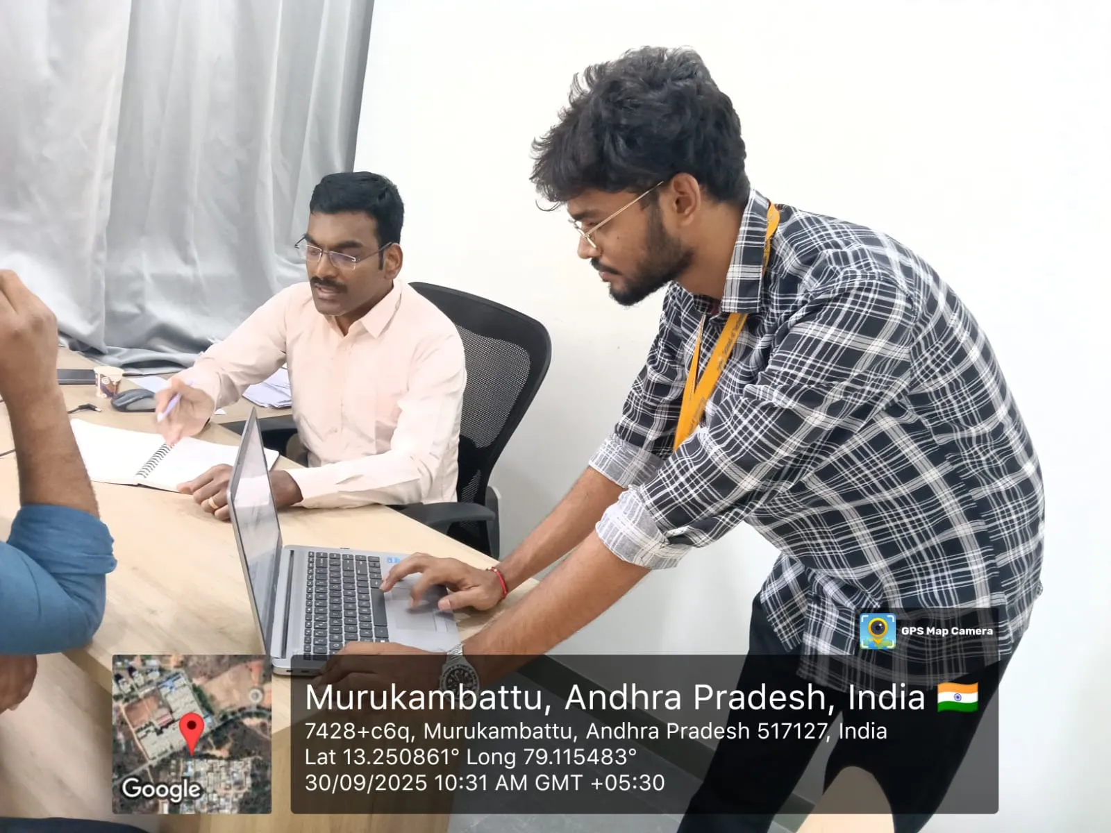 Mr.Antony and EWYL intern collaborating on practical learning discussions.