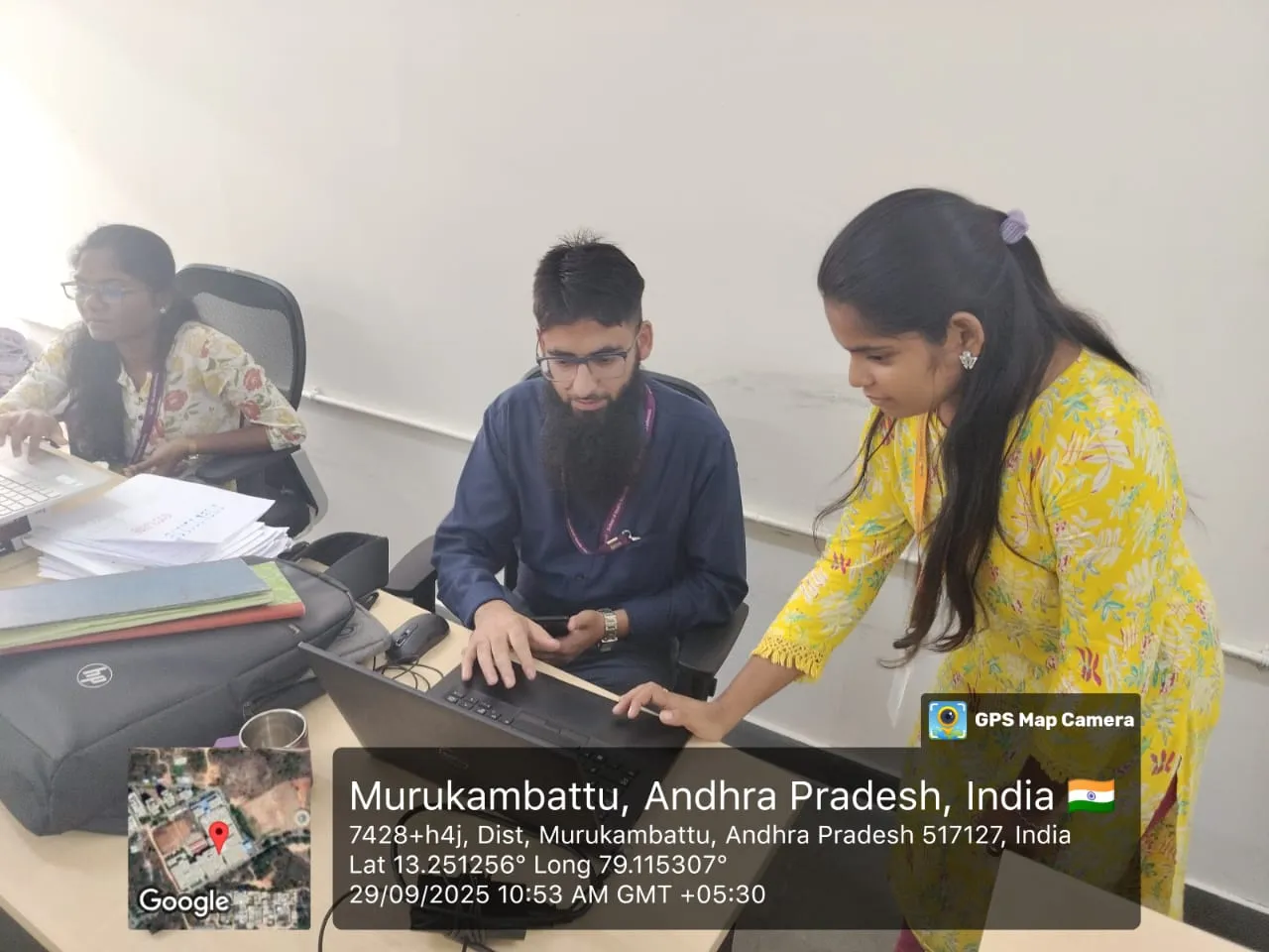 EWYL student intern discussing their ongoing projects with university faculty.