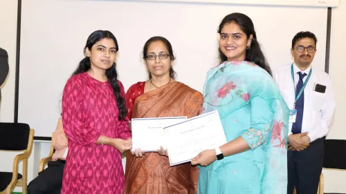 Dr. Jayanti presenting certificates to students at Apollo University