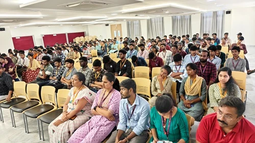 Audience attentively listening during the Swachh Bharat Mission event.