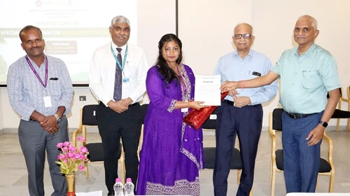 Students receiving awards for outstanding contribution to Swachh Bharat Mission.