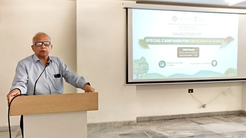 Vice Chancellor delivering a speech during the Swachh Bharat Mission event.
