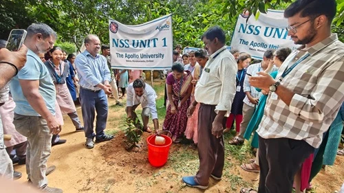 Dr.Hemadri Reddy and NSS members planting trees at district hospital for green initiative