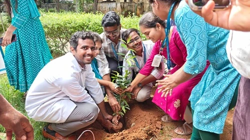 NSS students planting saplings to promote environmental awareness