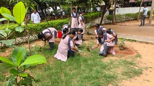 NSS team engaged in plantation activity at district hospital grounds