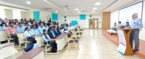 Dr. H. Vinod Bhat addressing students and faculty in an interactive session