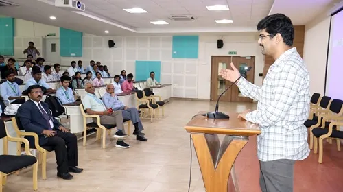 Students listening attentively as Shri Pradeep Kumar delivers a talk on Viksit Bharat.