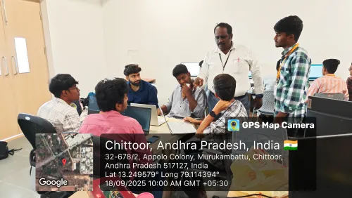 Apollo University students engaged in robotics and app development session